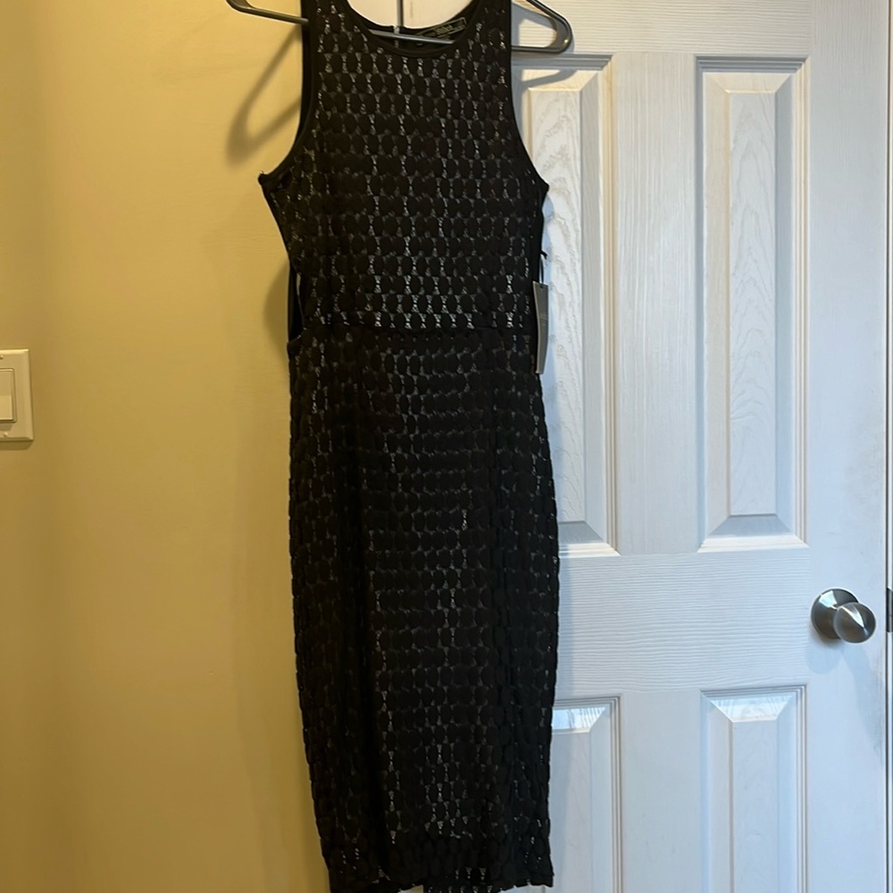 Sleeveless love stitch dress.